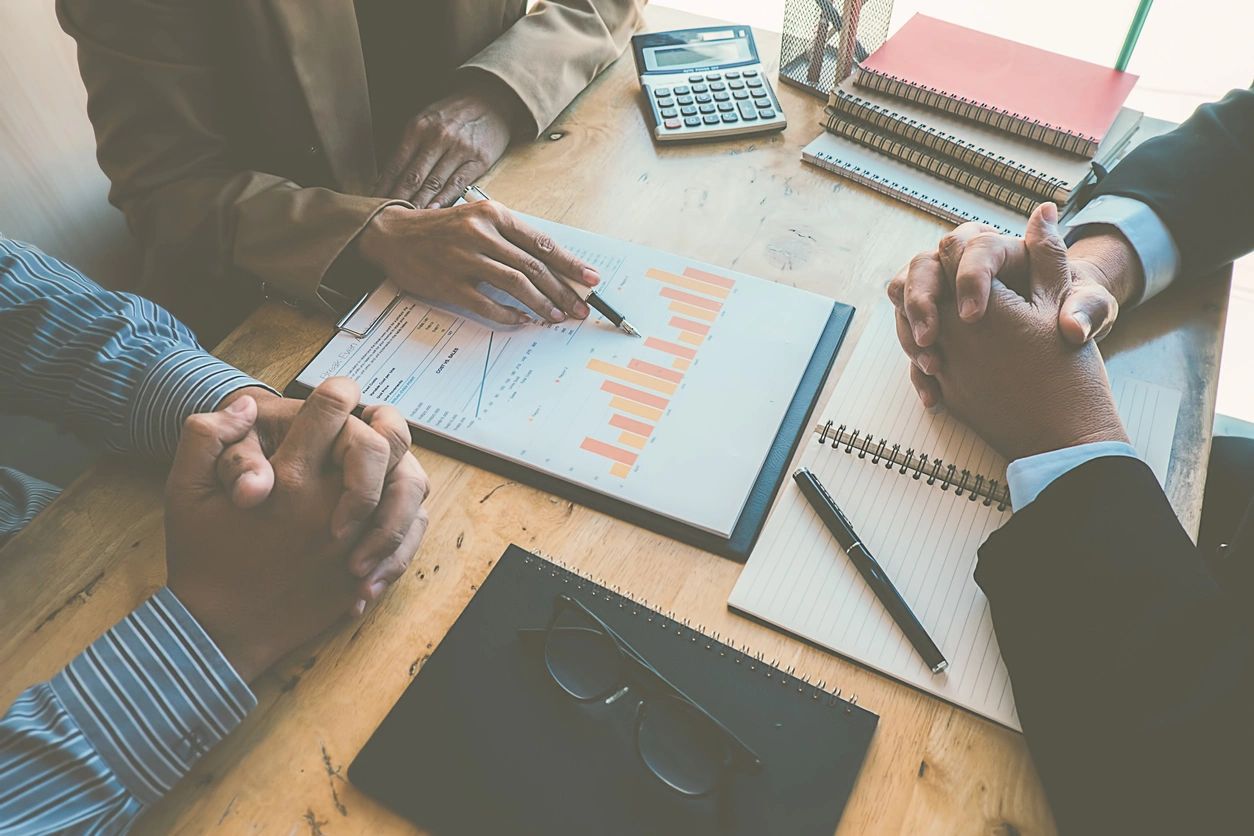 Business professionals reviewing financial data